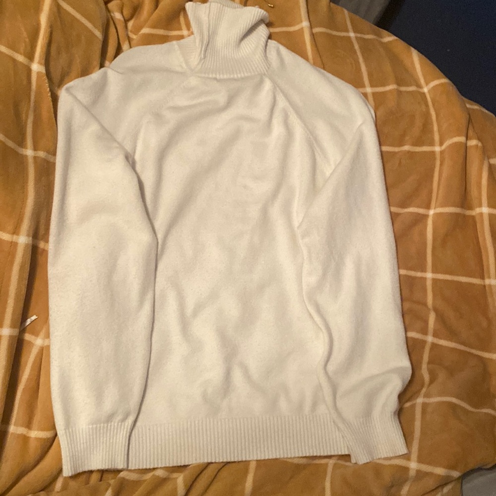 A white turtleneck worn only once